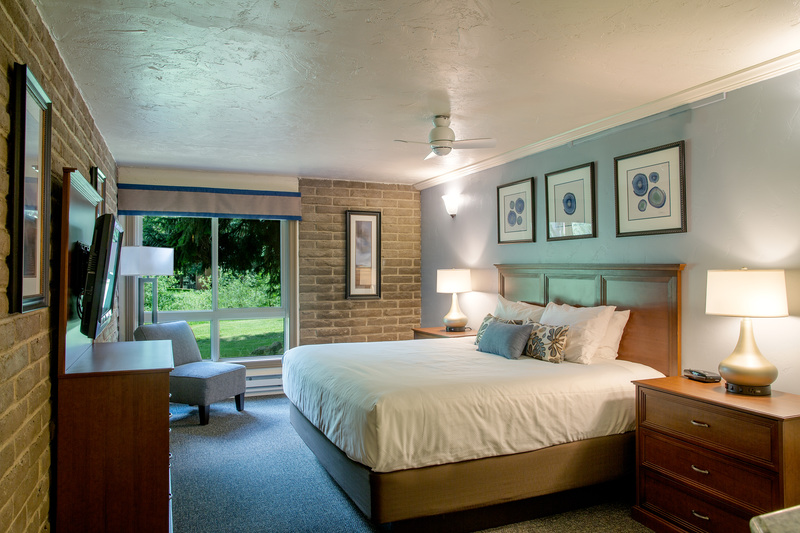 Bedroom with kingsize bed in one of our 2 bedroom condos, here at Sandstoone Creek Club, Hotel and Timeshares in Vail, Colorado